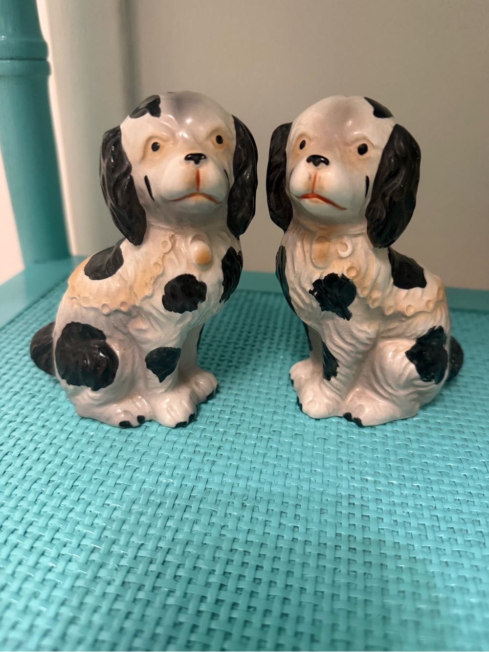 Pair of White and Black Staffordshire salt and pepper shaker dogs